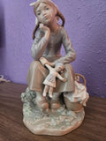 LLADRO RETIRED DAYDREAMING  GIRL WITH DOLL.  #1211 Model