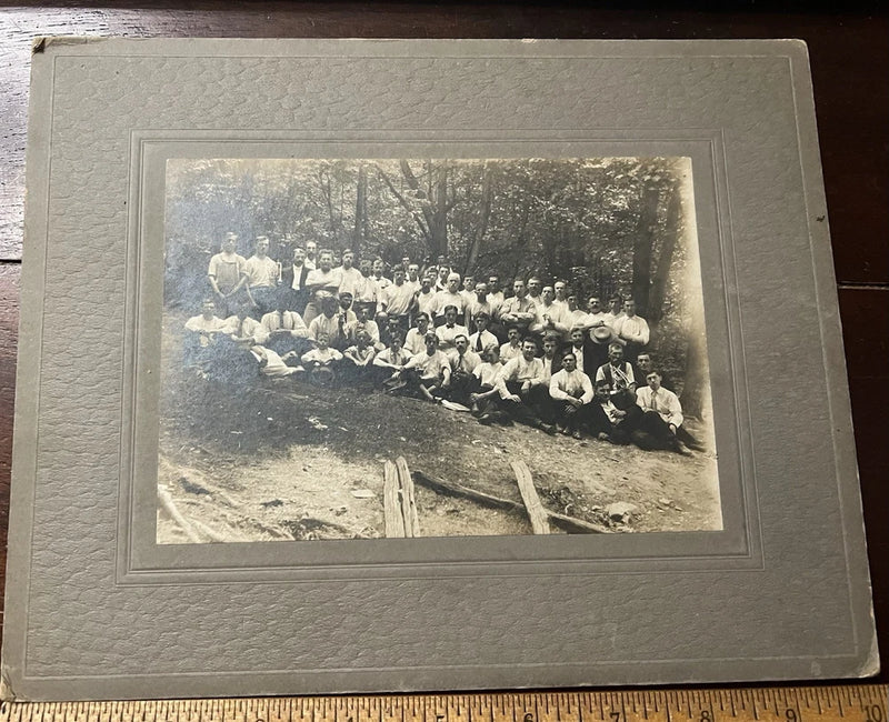 Photo on Board, Group of Men and Boys, Mostly white Shirts, 2 with Coronets Model