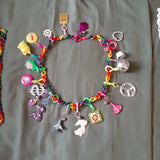 BELL CHARM NECKLACE w/ 19 CHARMS  all different also extra chains NEVER USED Charms