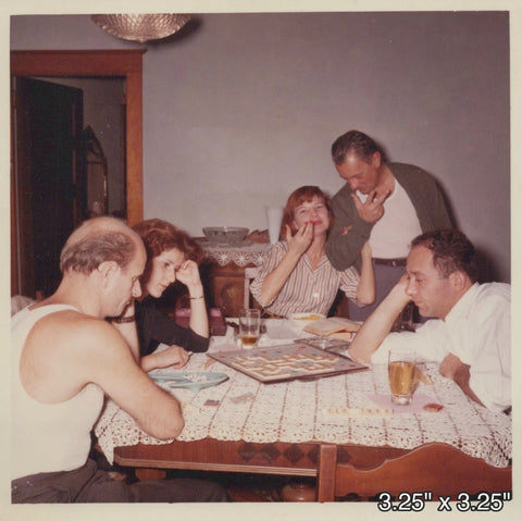 Family Playing Scrabble Board Game Table Indoors Gathering VINTAGE PHOTO Model