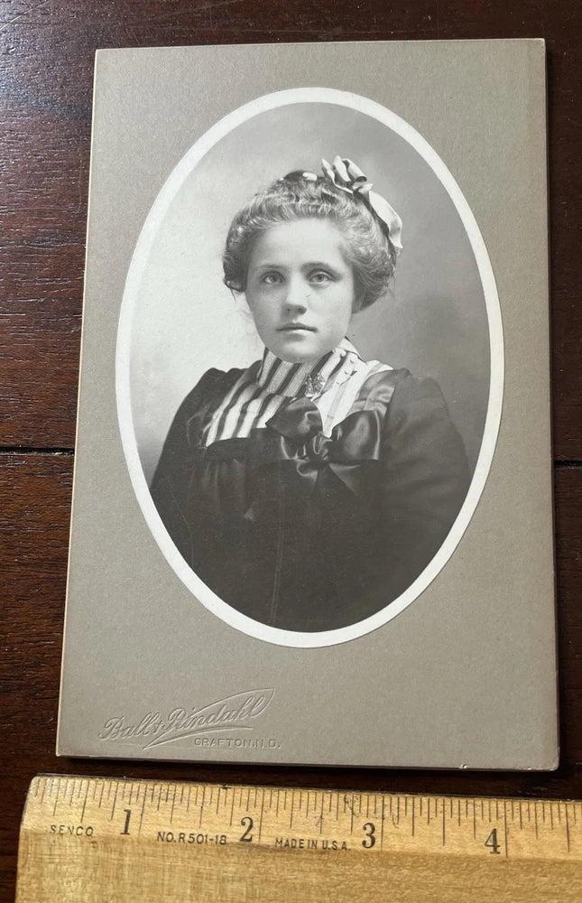 Photo on Board Young Woman Bows,Ball and Rindahl Photographer Grafton N.D. Model