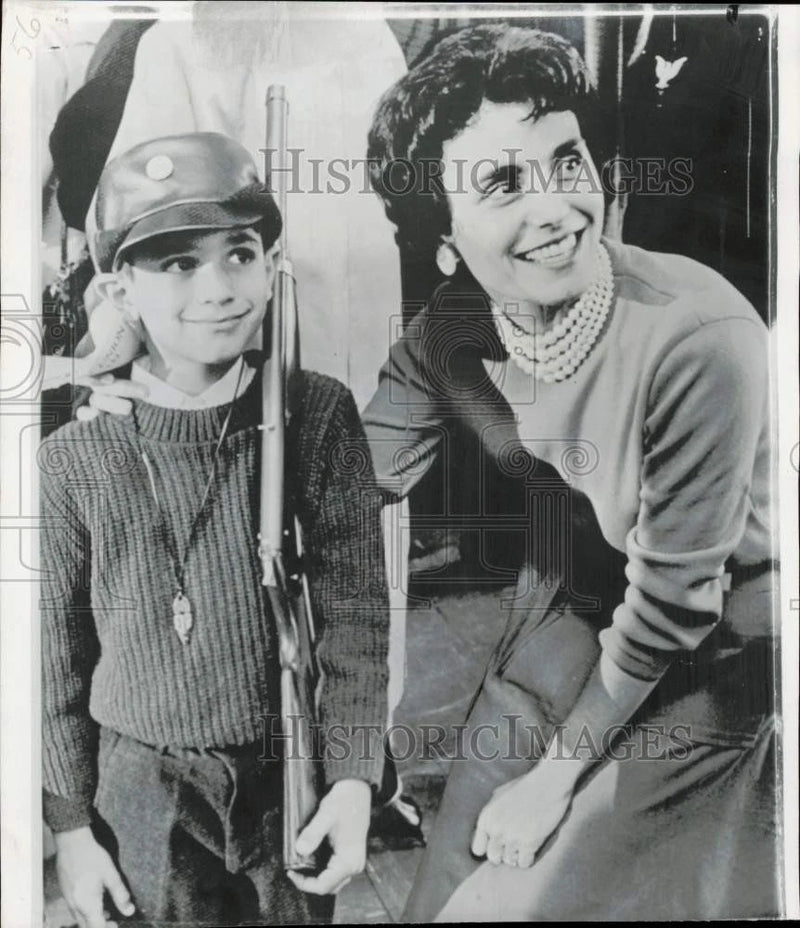 1962 Press Photo May Gazenave and Son Craig Board Plane to Guantanamo Naval Base Model