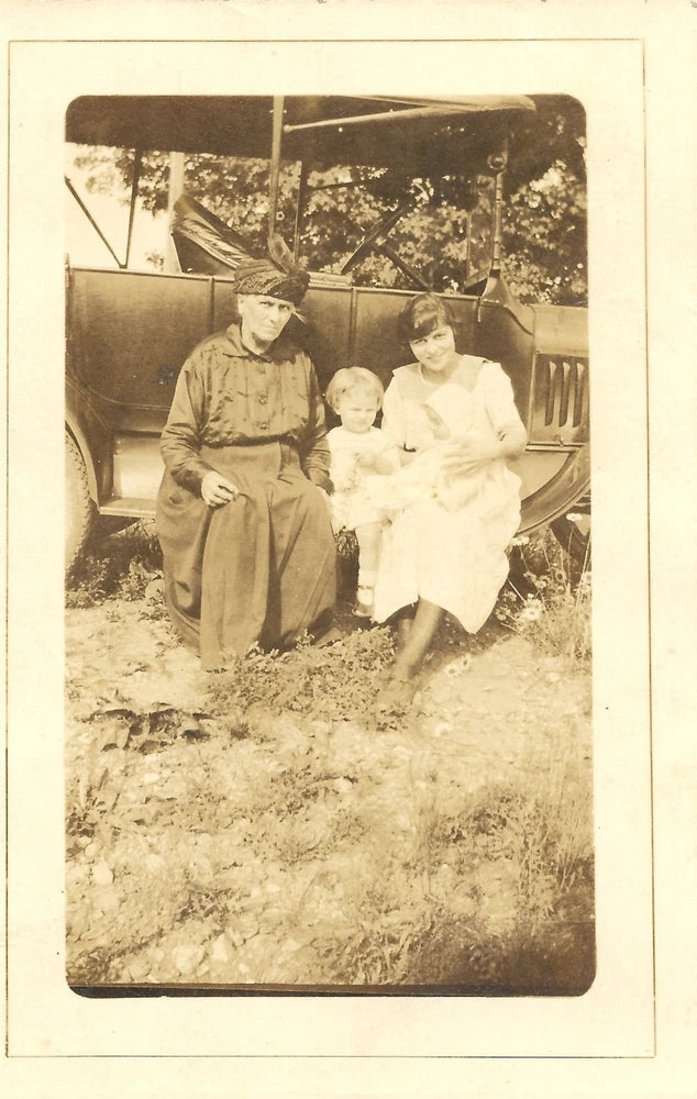 vintage antique photo women girl baby sitting on running board of antique car Model