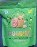 The Woobles Mimi The Snail Learn to Crochet Kit for Beginners Glitter Yarn Model