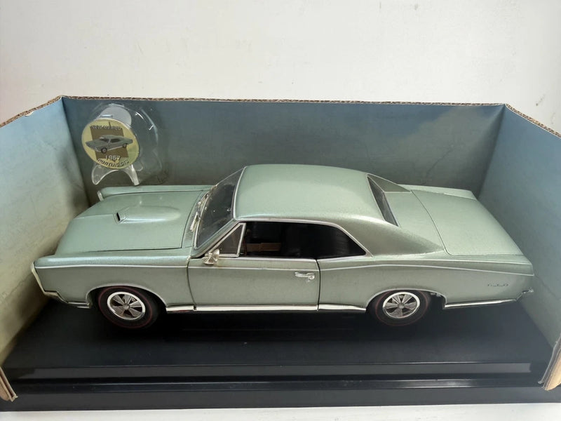 Ertl 1967 Pontiac GTO Get Your Kicks Route 66 Coin 1/18 American Muscle Diecast Model